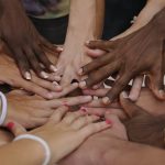 Diverse human hands showing unity